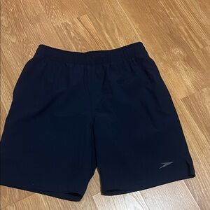 Speedo Men's Navy Athletic Shorts swim trunks small has pockets.